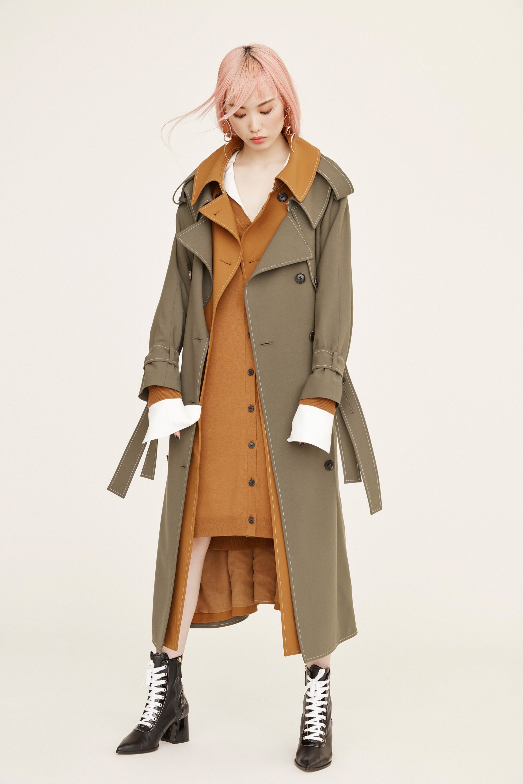 green trench coat and brown dress
