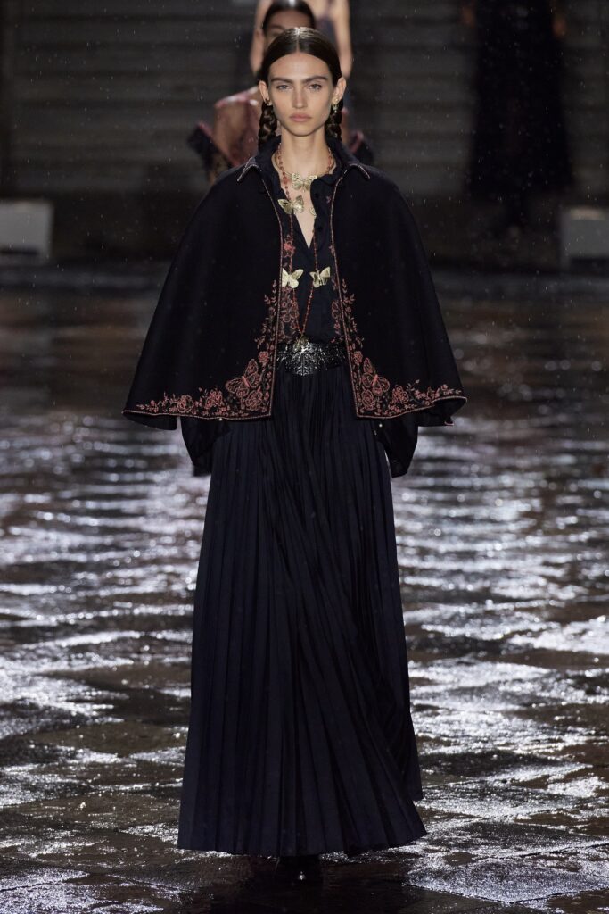 black embroidered cape and dress