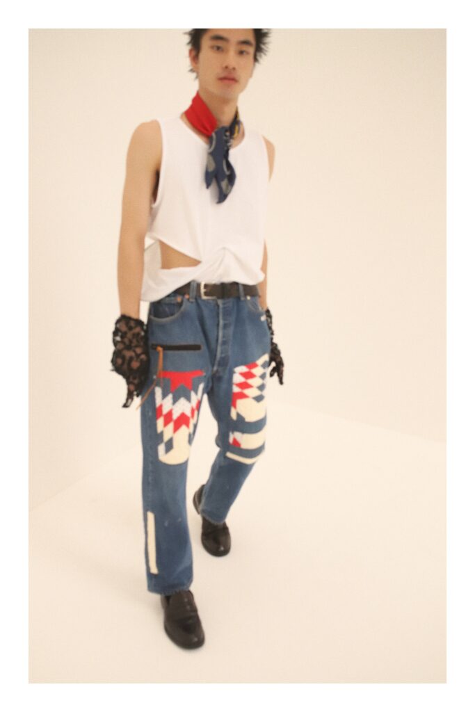 white tank-top and blue pants