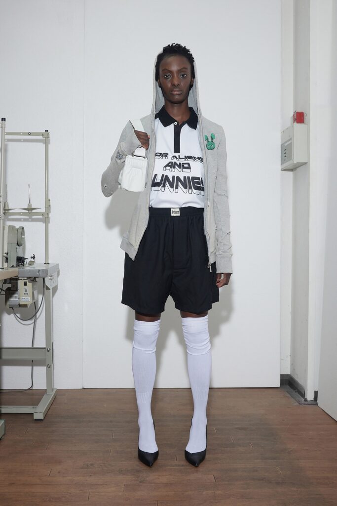 gray hoodie with black shorts