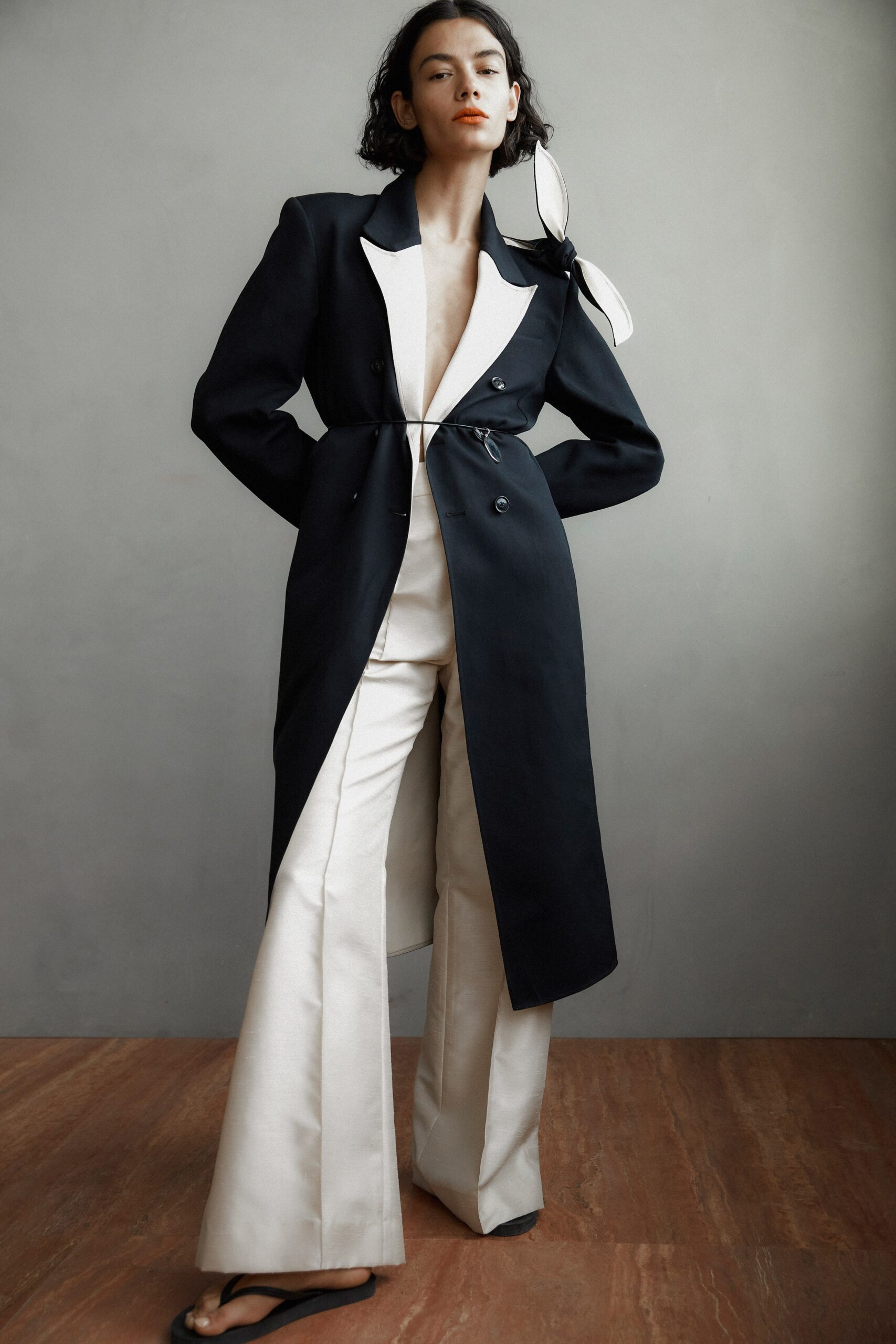 black and white tailored trench coat