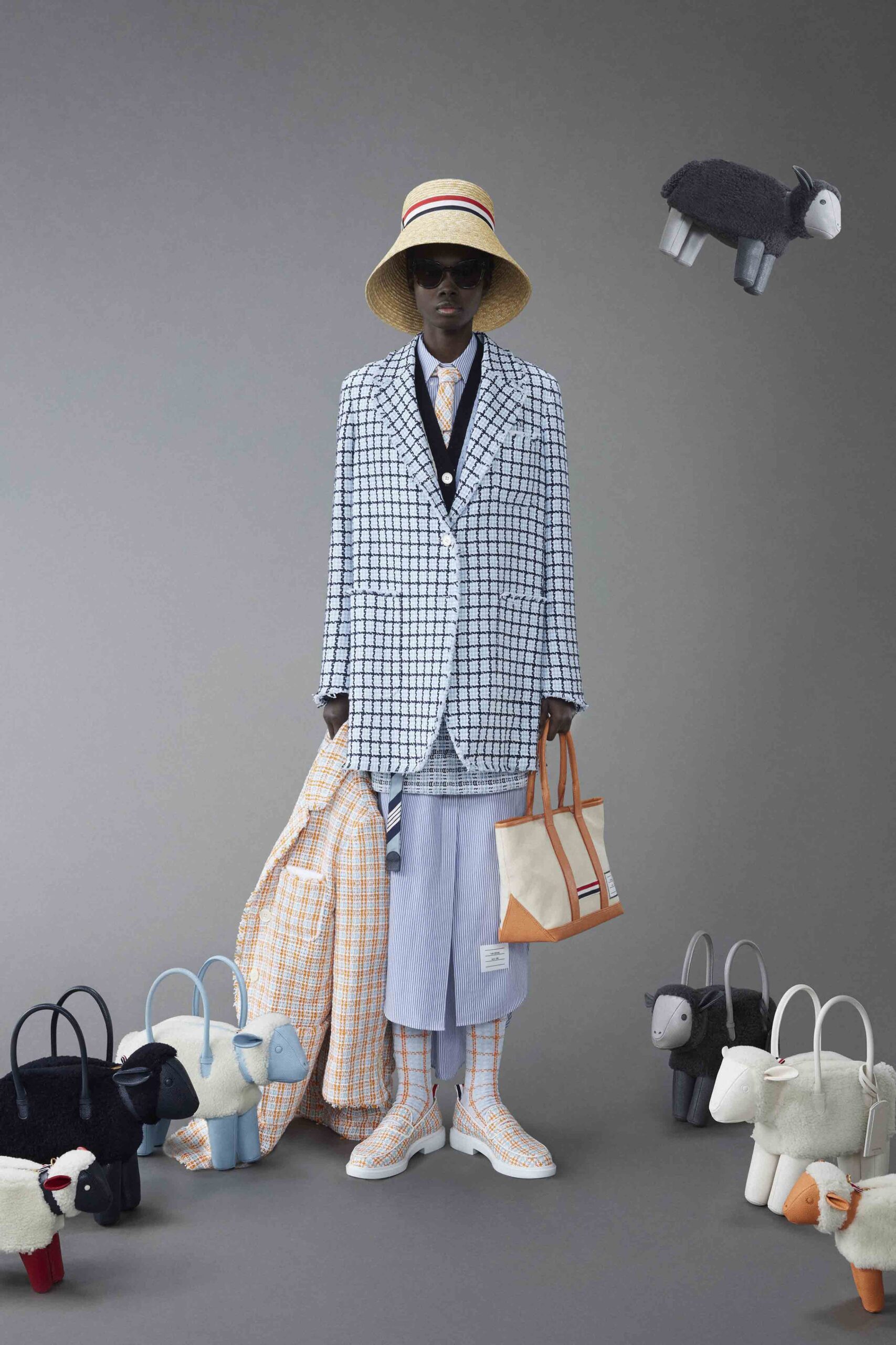 A tailored blue and white checked blazer paired with matching pants.