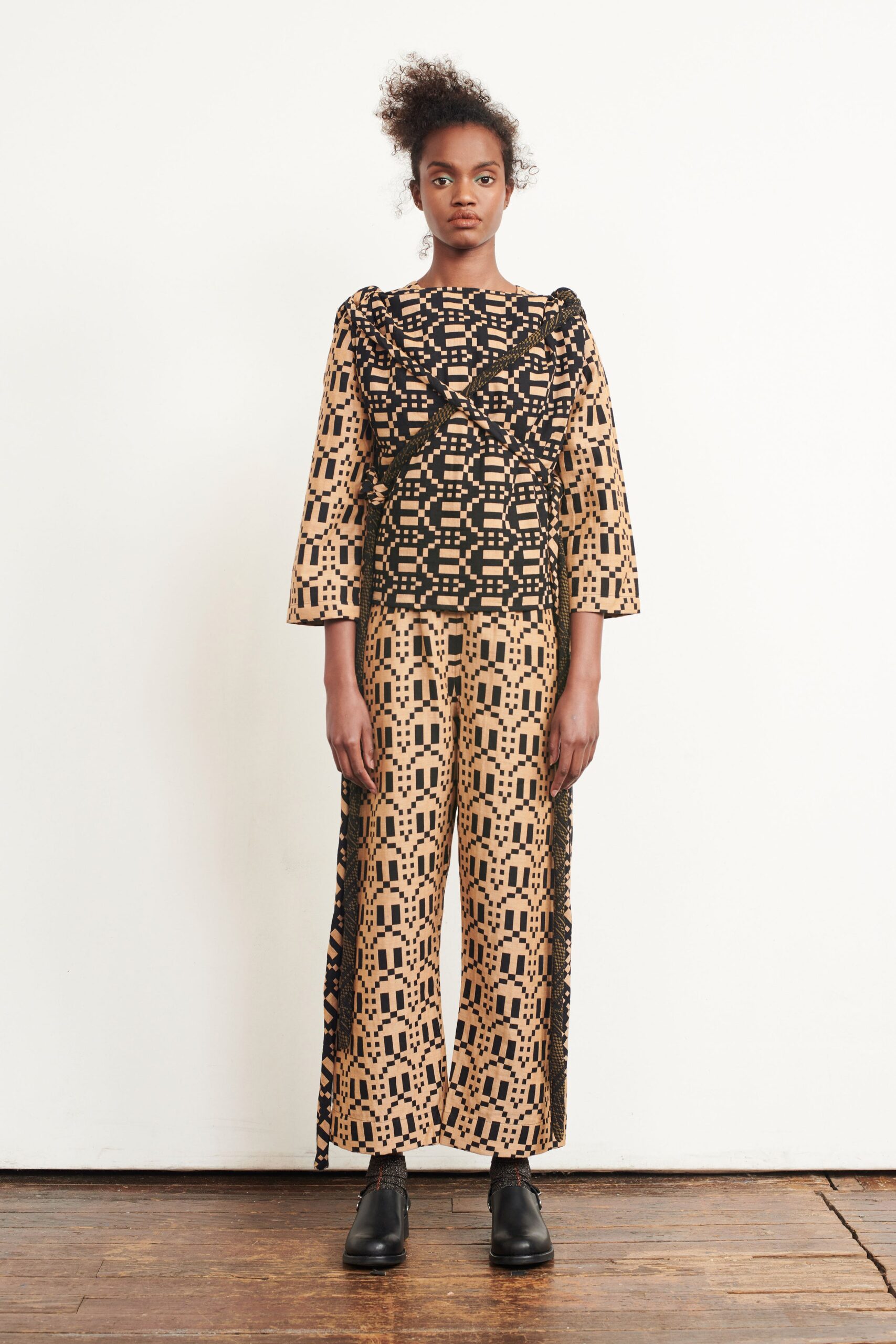printed black and beige top and pants
