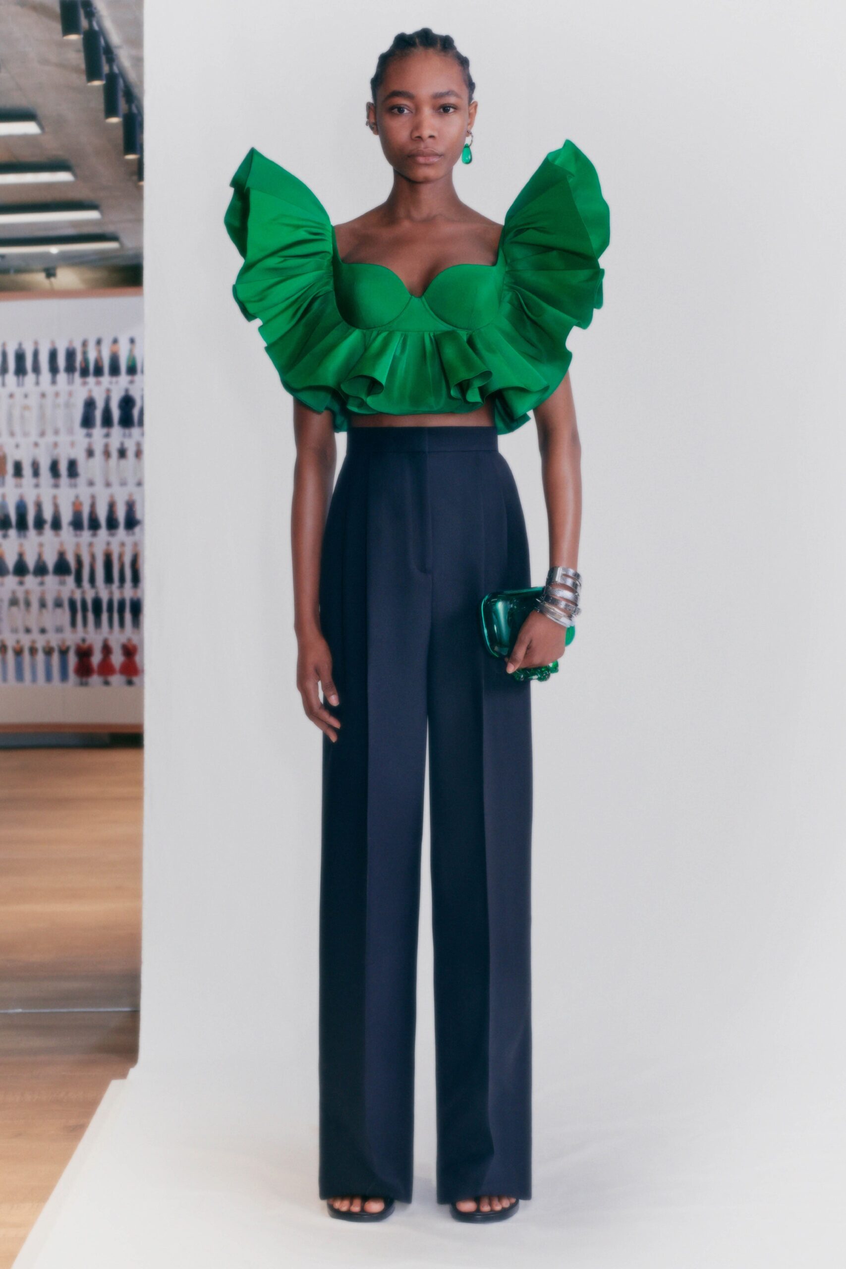 green silk sleeveless off-shoulder fitted ruffled top