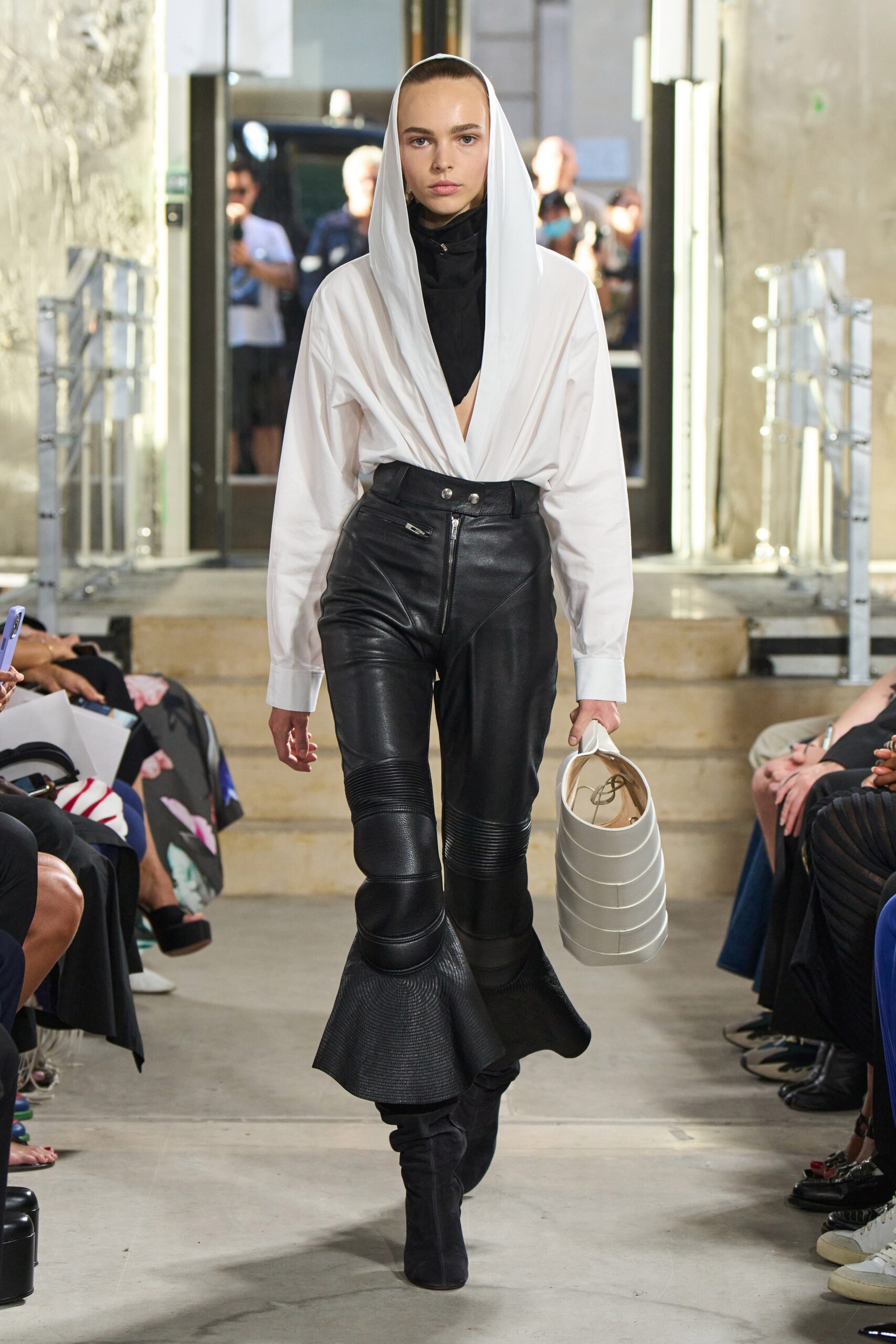 white fitted shirt black leather pants