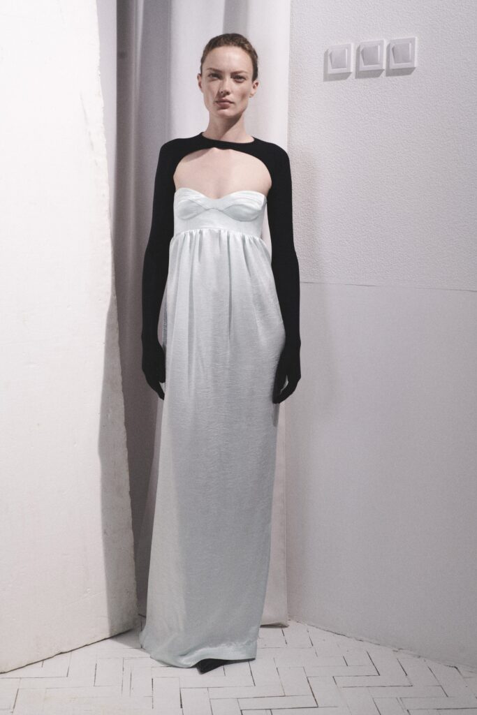 A relaxed black and white strapless dress with a maxi silhouette.