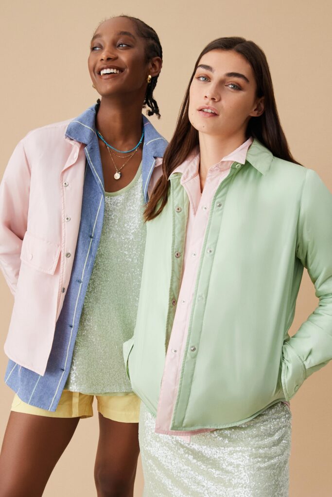 Two relaxed jackets in pink and green with long sleeves and buttoned details.