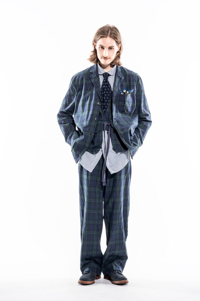 A relaxed fit blue and green checked jacket paired with matching pants.