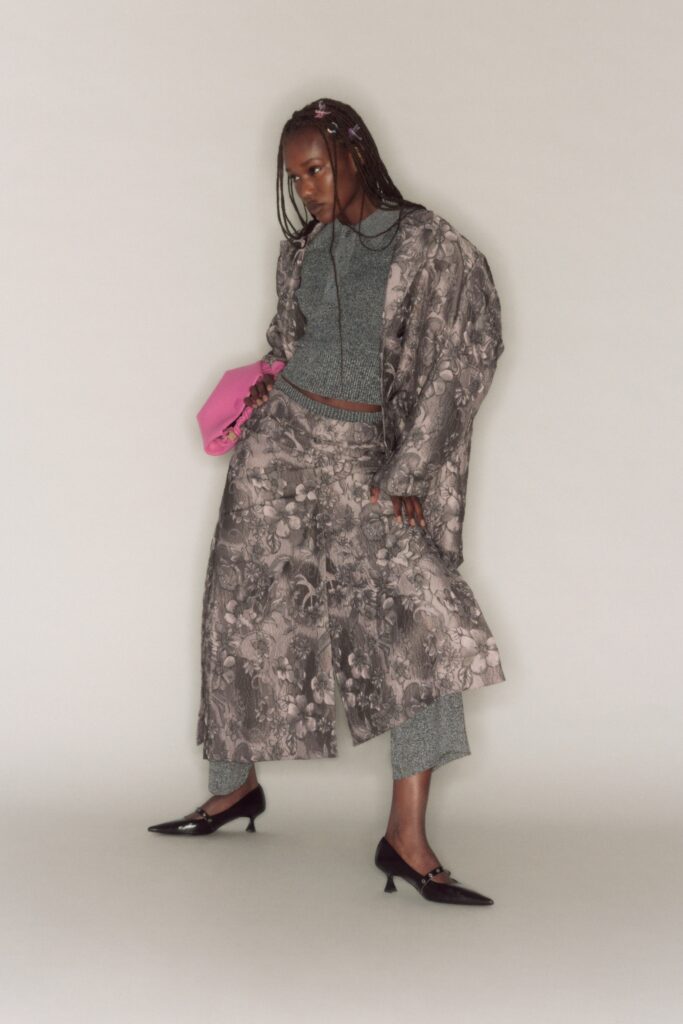 A relaxed gray cotton jacket with long sleeves and printed pants for a stylish look.