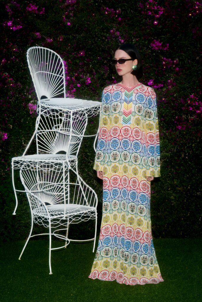 A relaxed multicolor printed long-sleeve dress featuring a V-neckline.