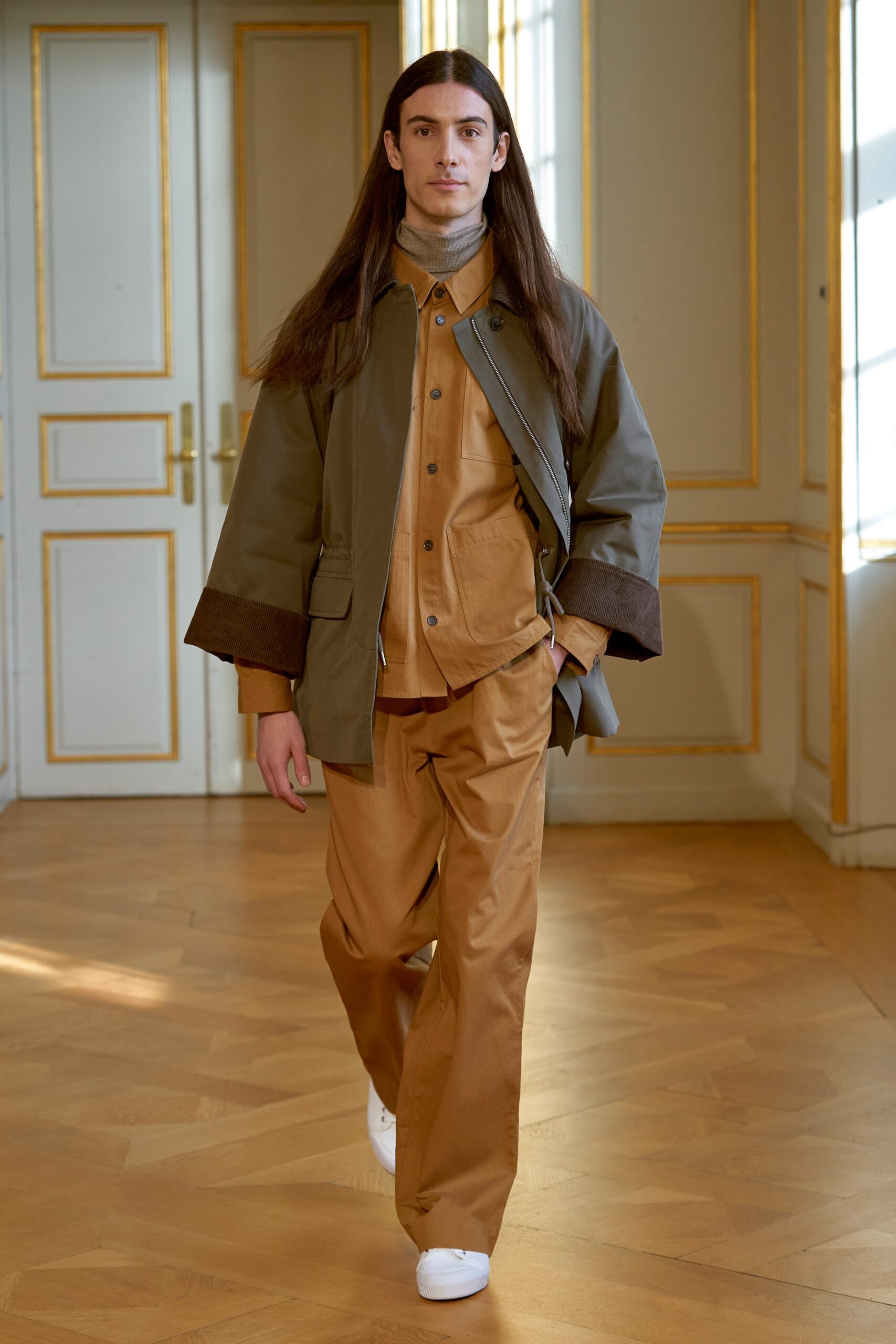 green jacket brown shirt pants