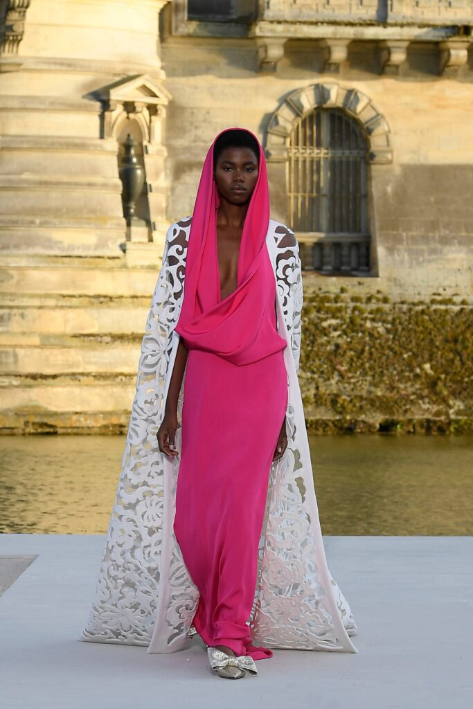 pink silk gown with white cape