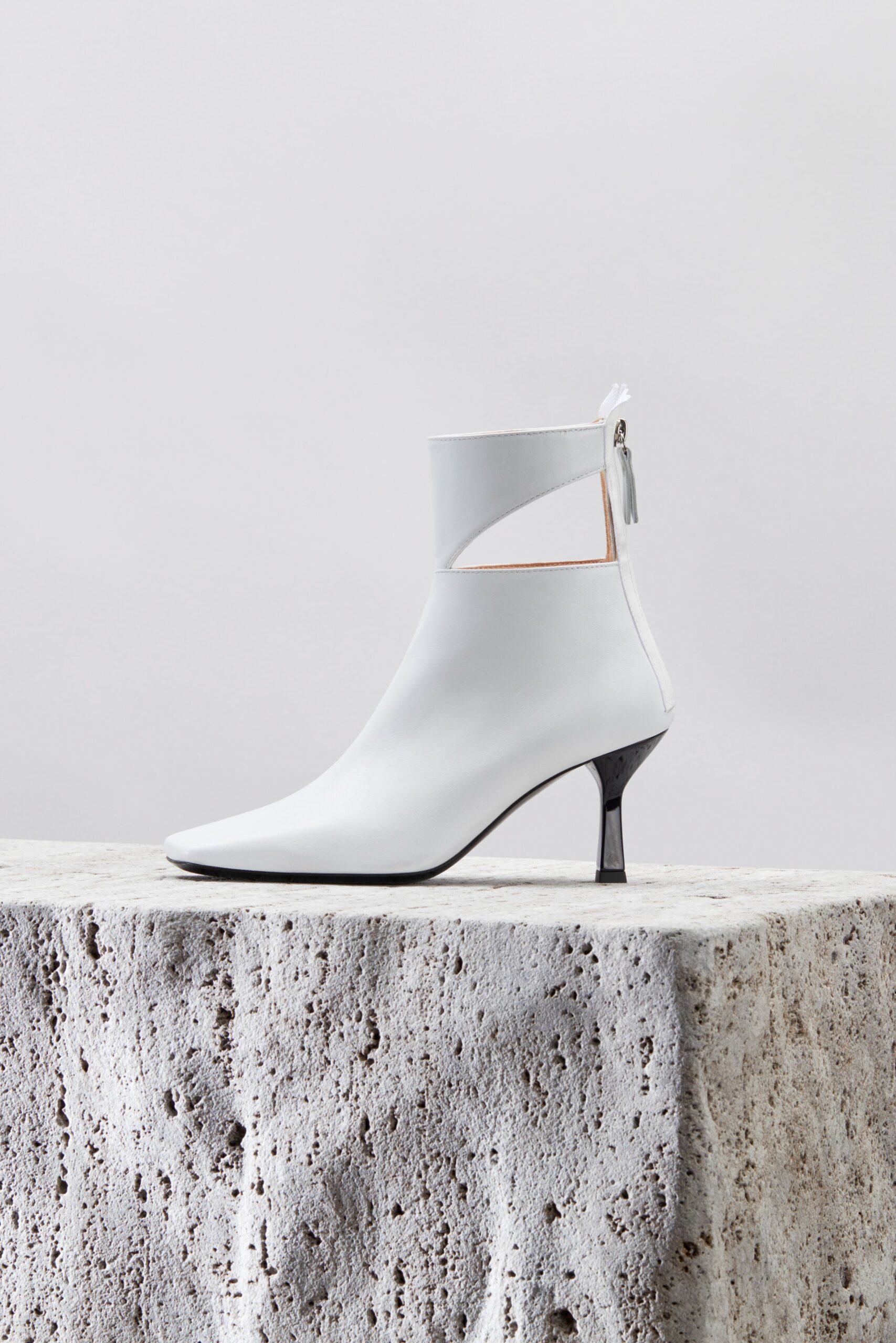 white leather ankle boots