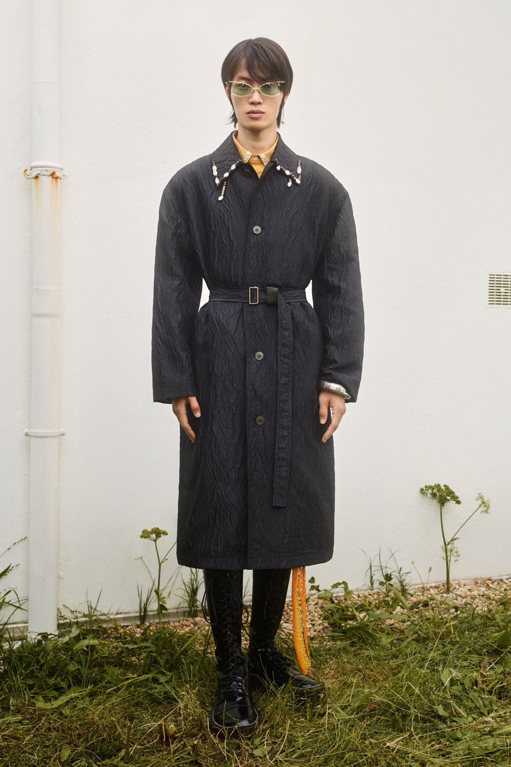 black cotton long-sleeve collared relaxed belted textured coat
