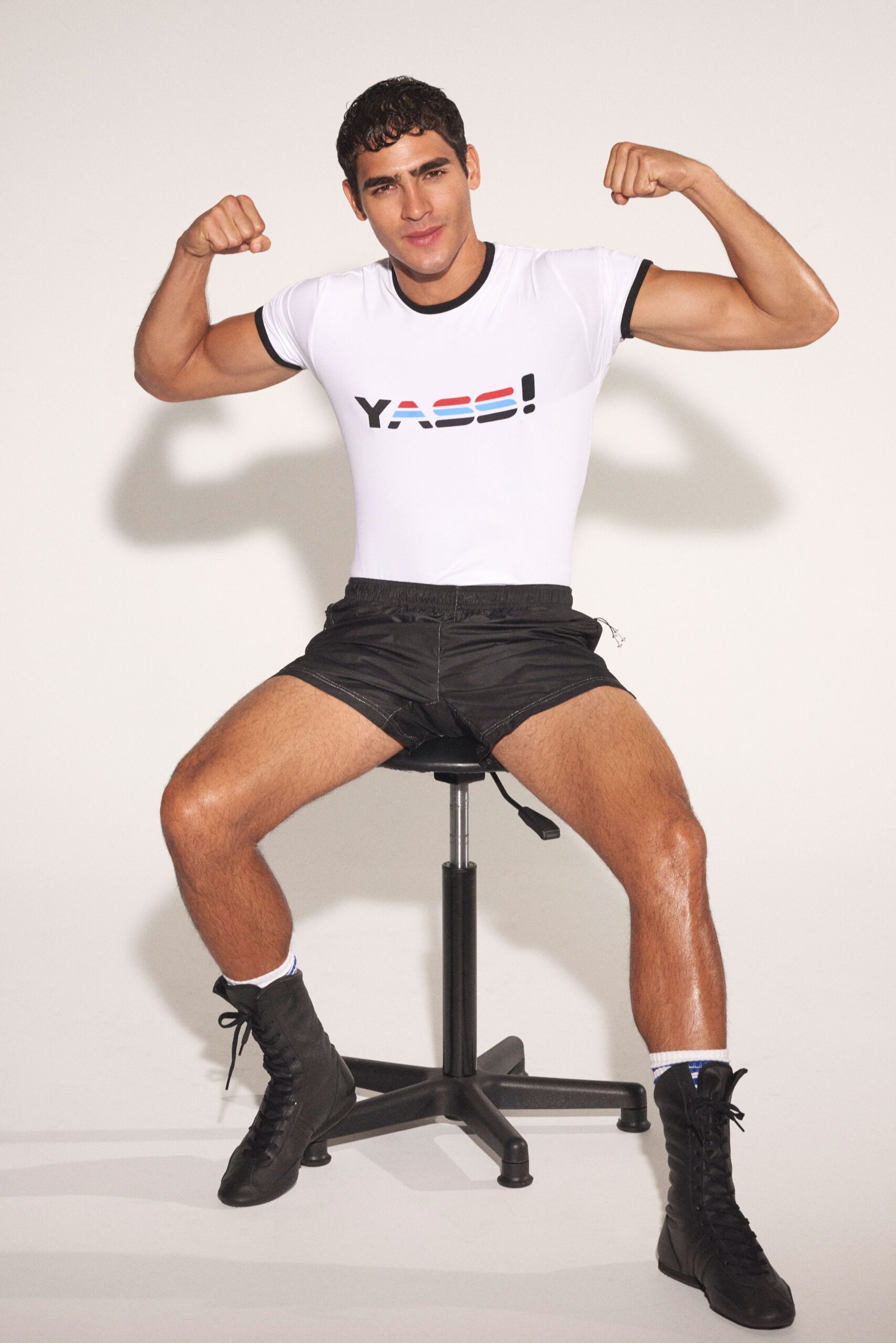 fitted white t-shirt and black shorts