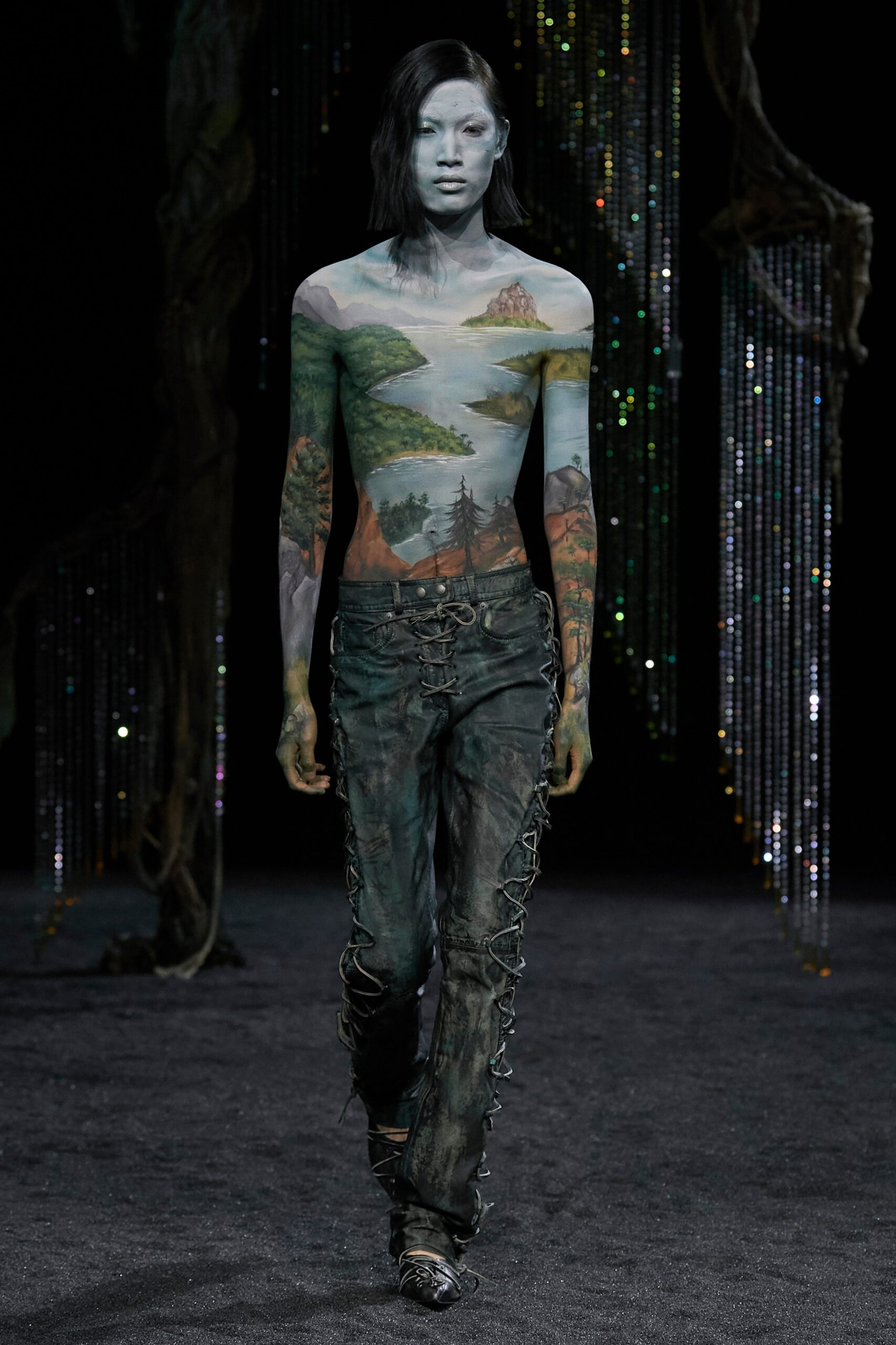 Fitted multicolor printed denim pants with a unique artistic design.