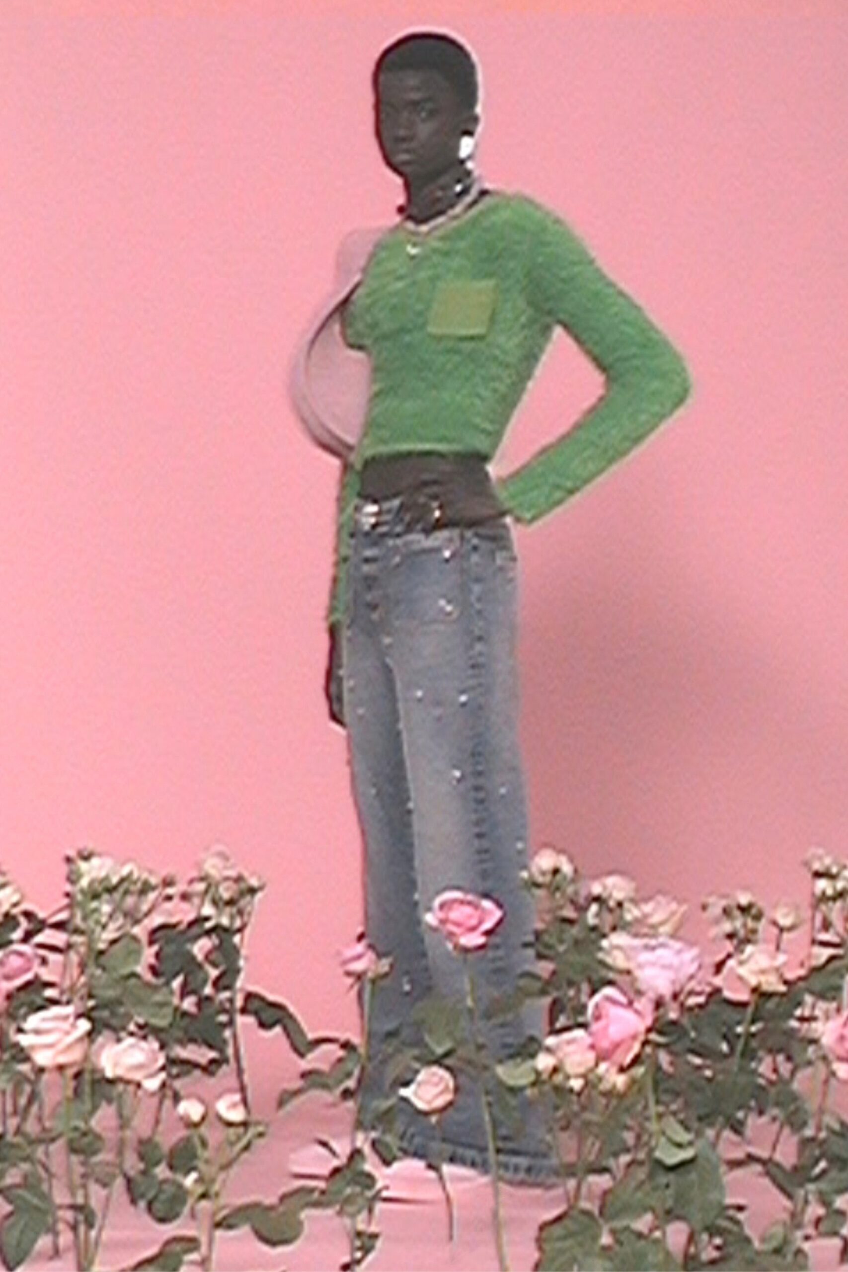 fitted green top with slim jeans