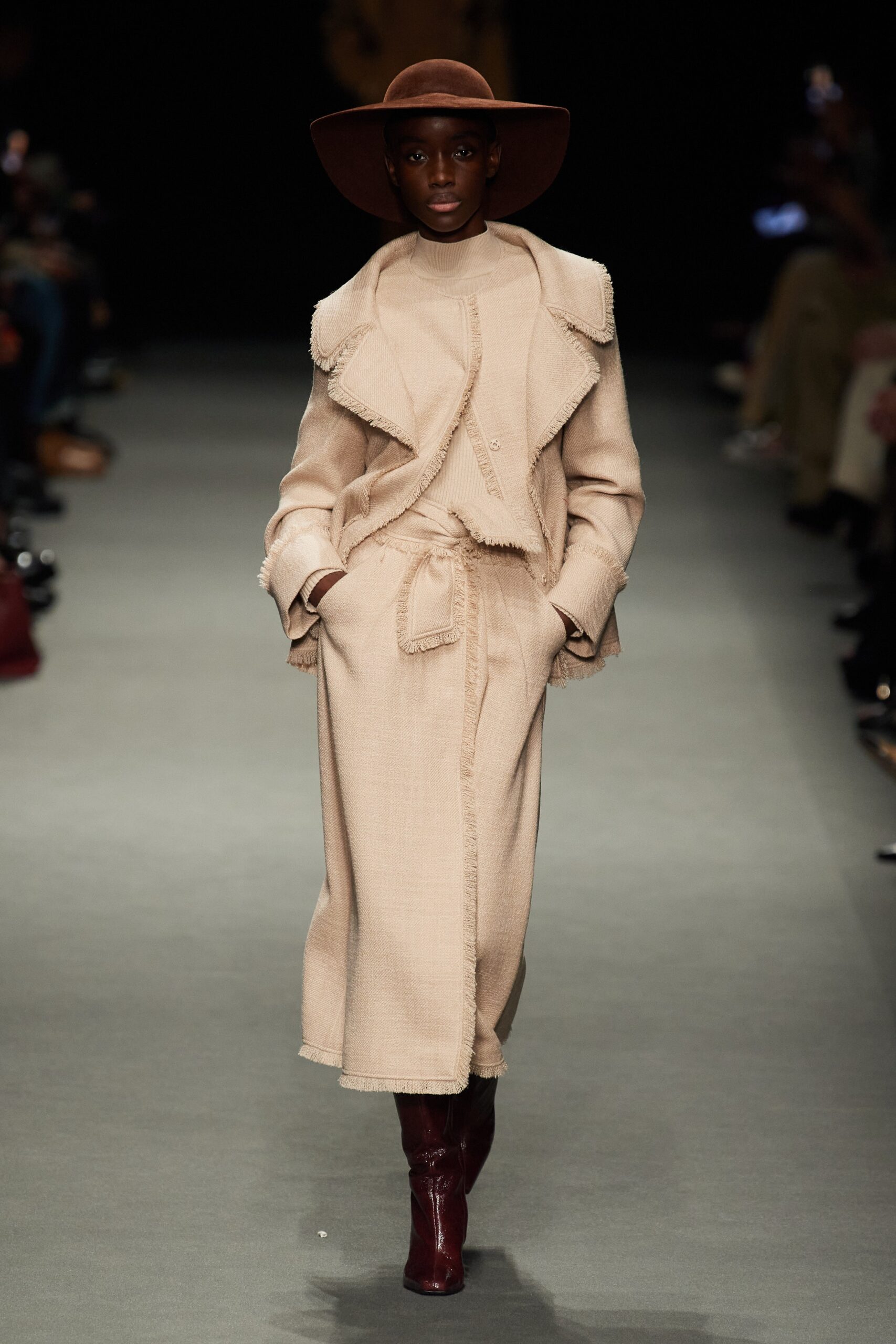 beige wool belted coat with brown hat
