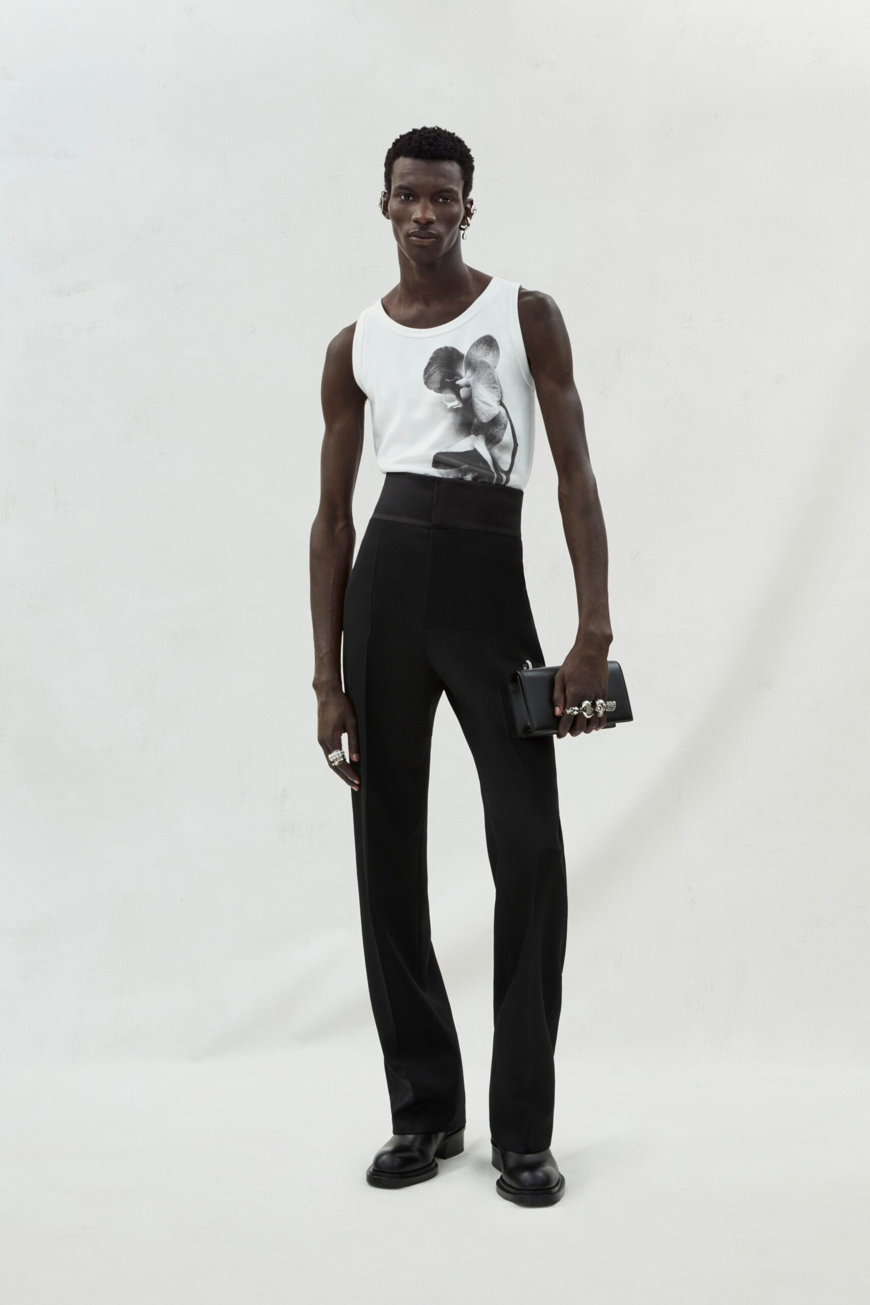 white fitted top and black tailored pants