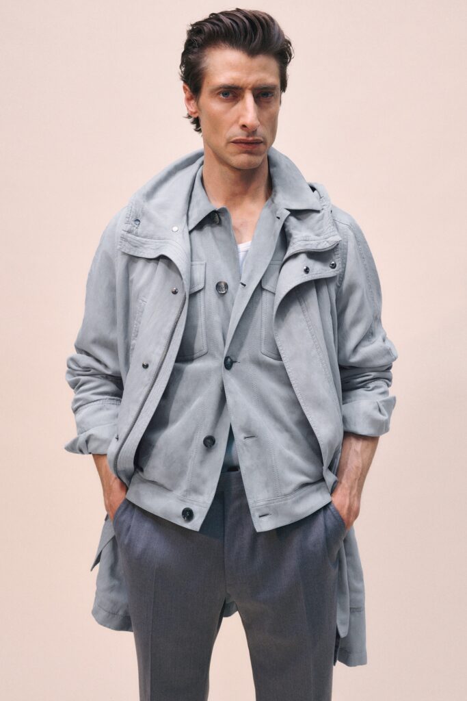 A relaxed gray jacket with long sleeves and collared design paired with matching pants.