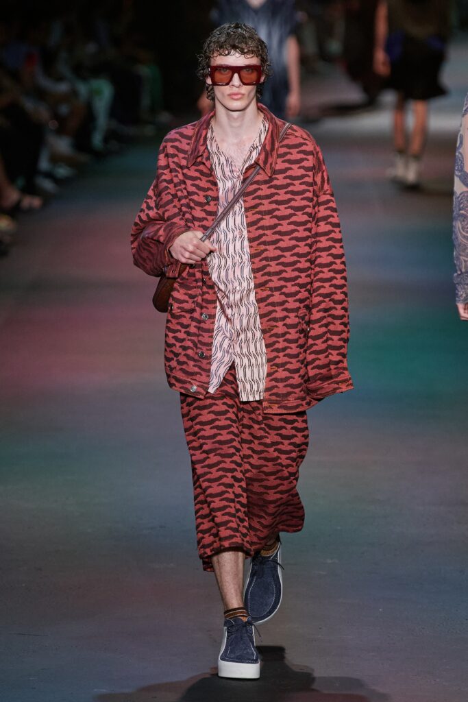 A relaxed fit red printed long-sleeve shirt paired with matching pants.