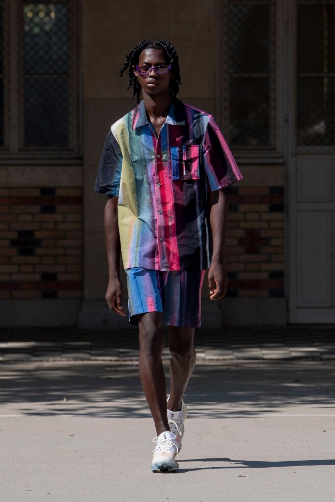 A relaxed-fit multicolor cotton shirt with short sleeves and matching shorts, featuring a printed design.