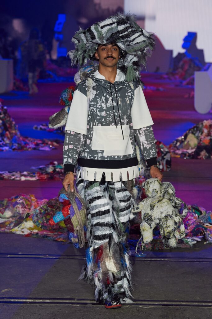 gray printed hoodie with striped pants