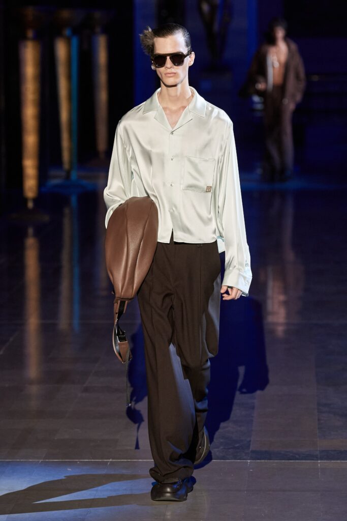 white silk relaxed shirt with black pants