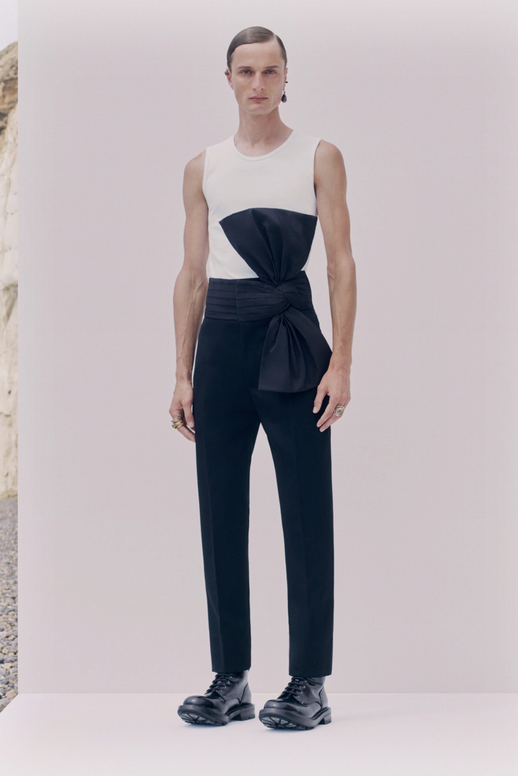 fitted black and white top with tailored pants