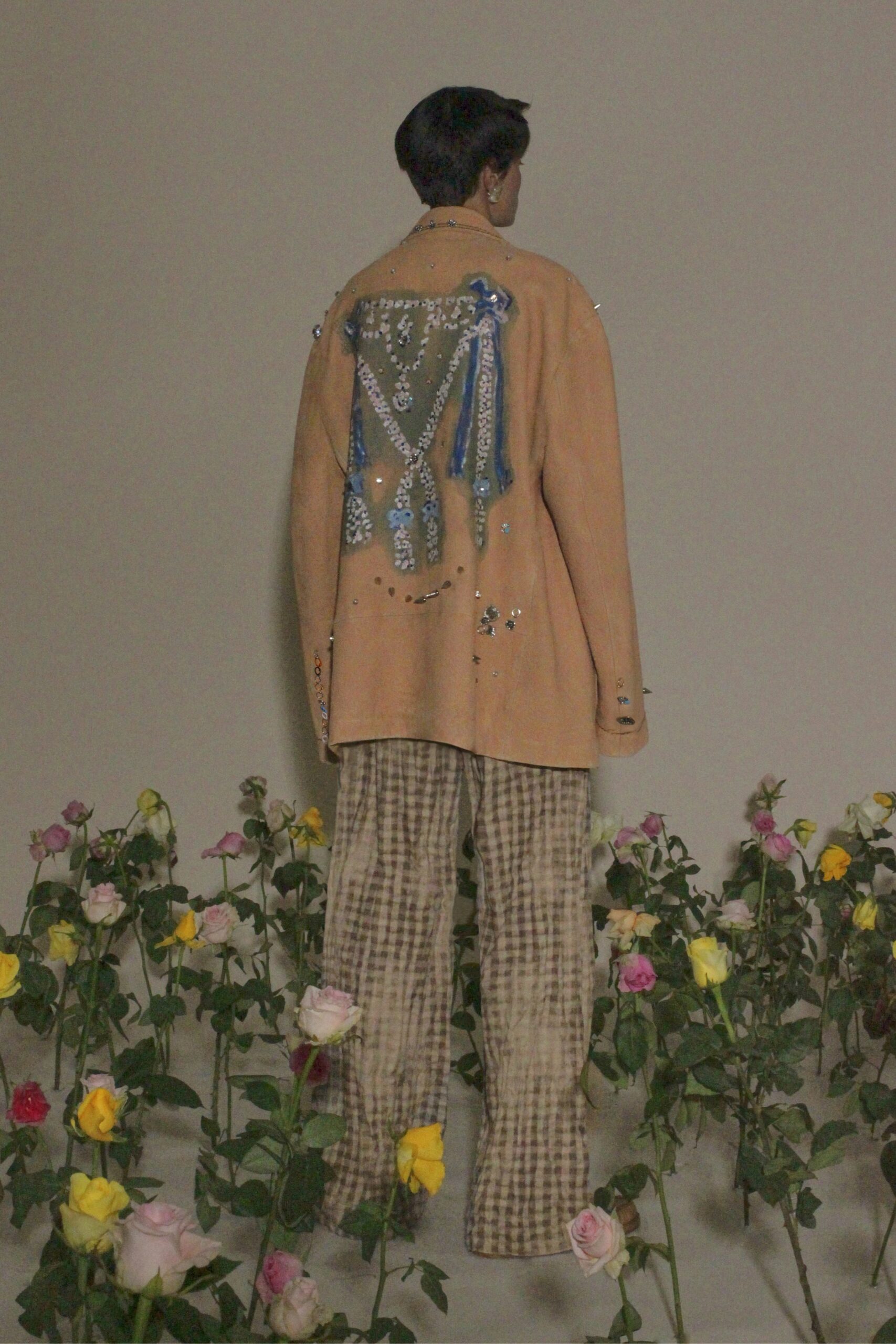 beige embroidered jacket with checked pants