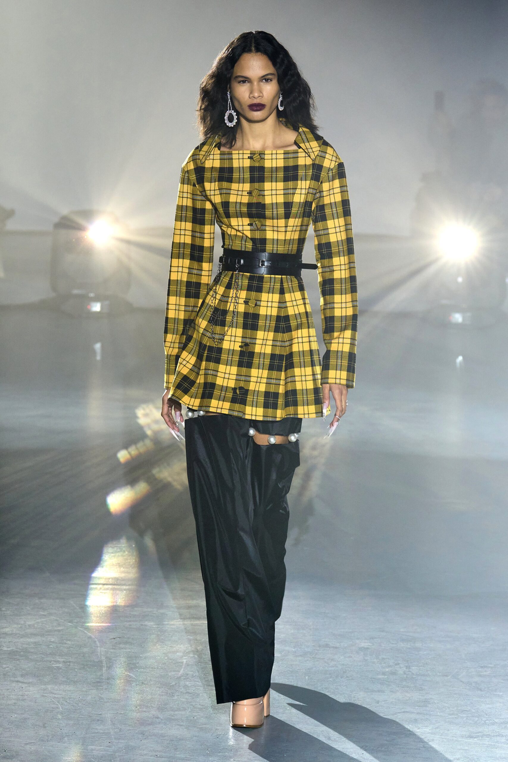 yellow black checked dress with vinyl pants