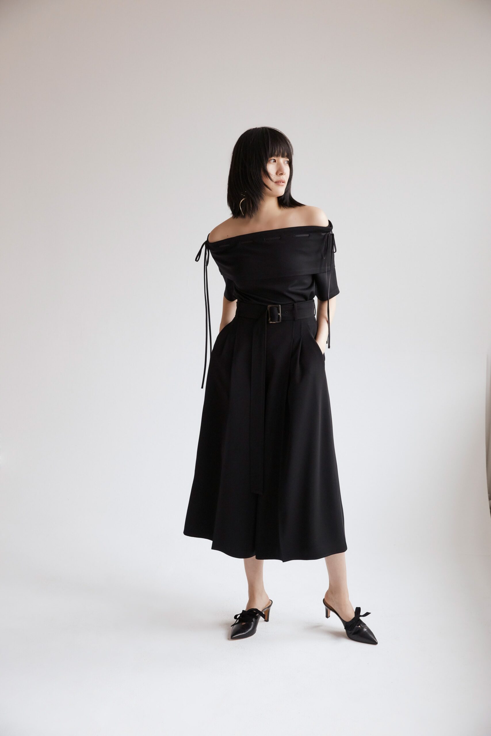 black silk off-shoulder top and culottes