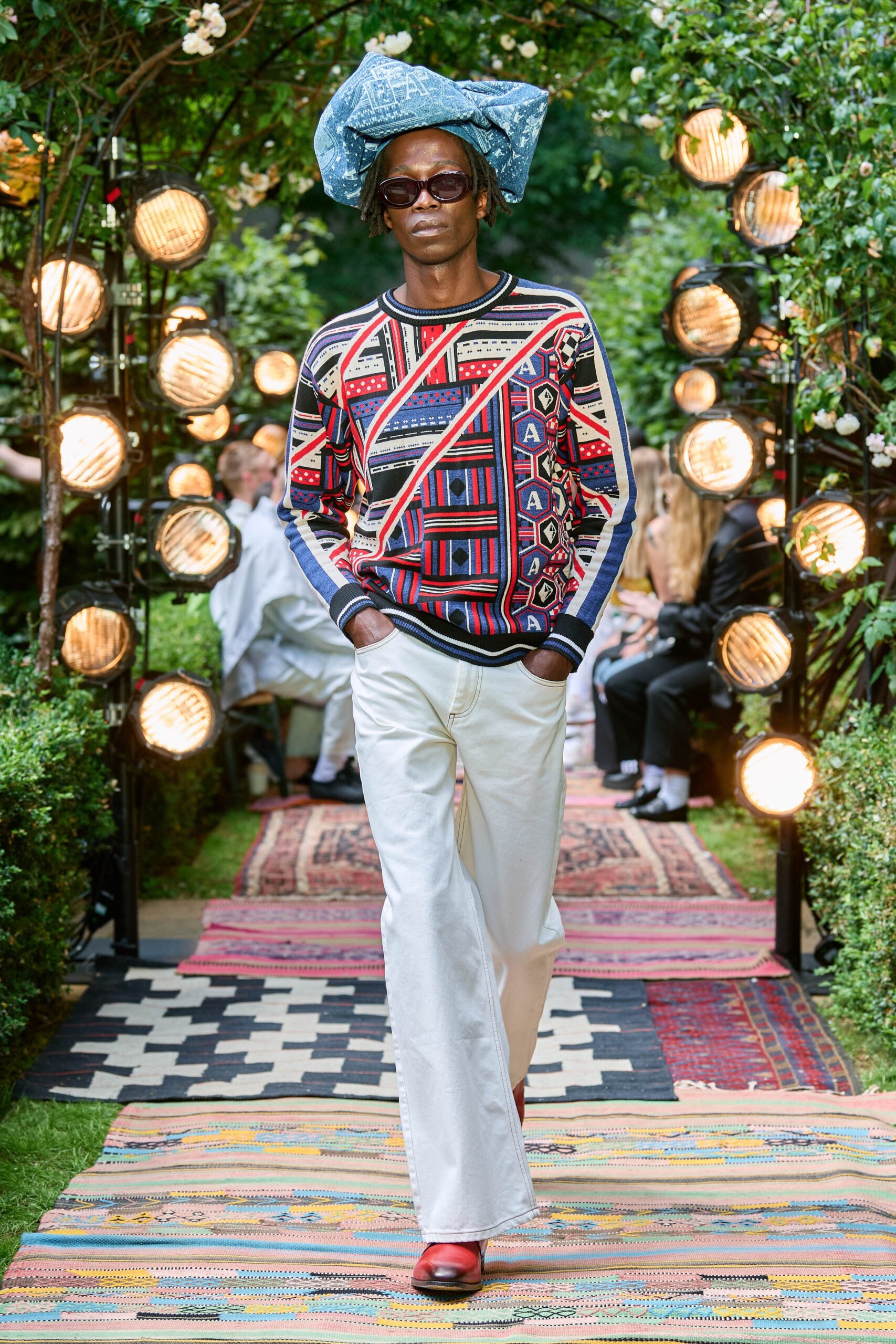 multi-colored printed sweater with flared pants