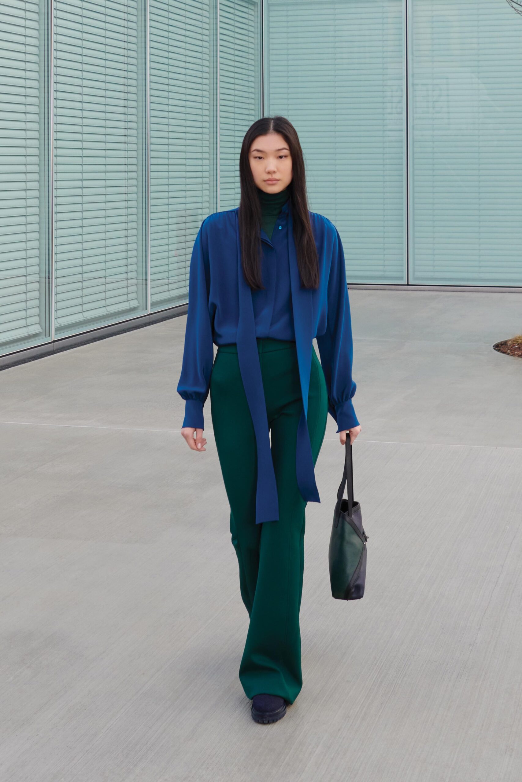green fitted flared pants