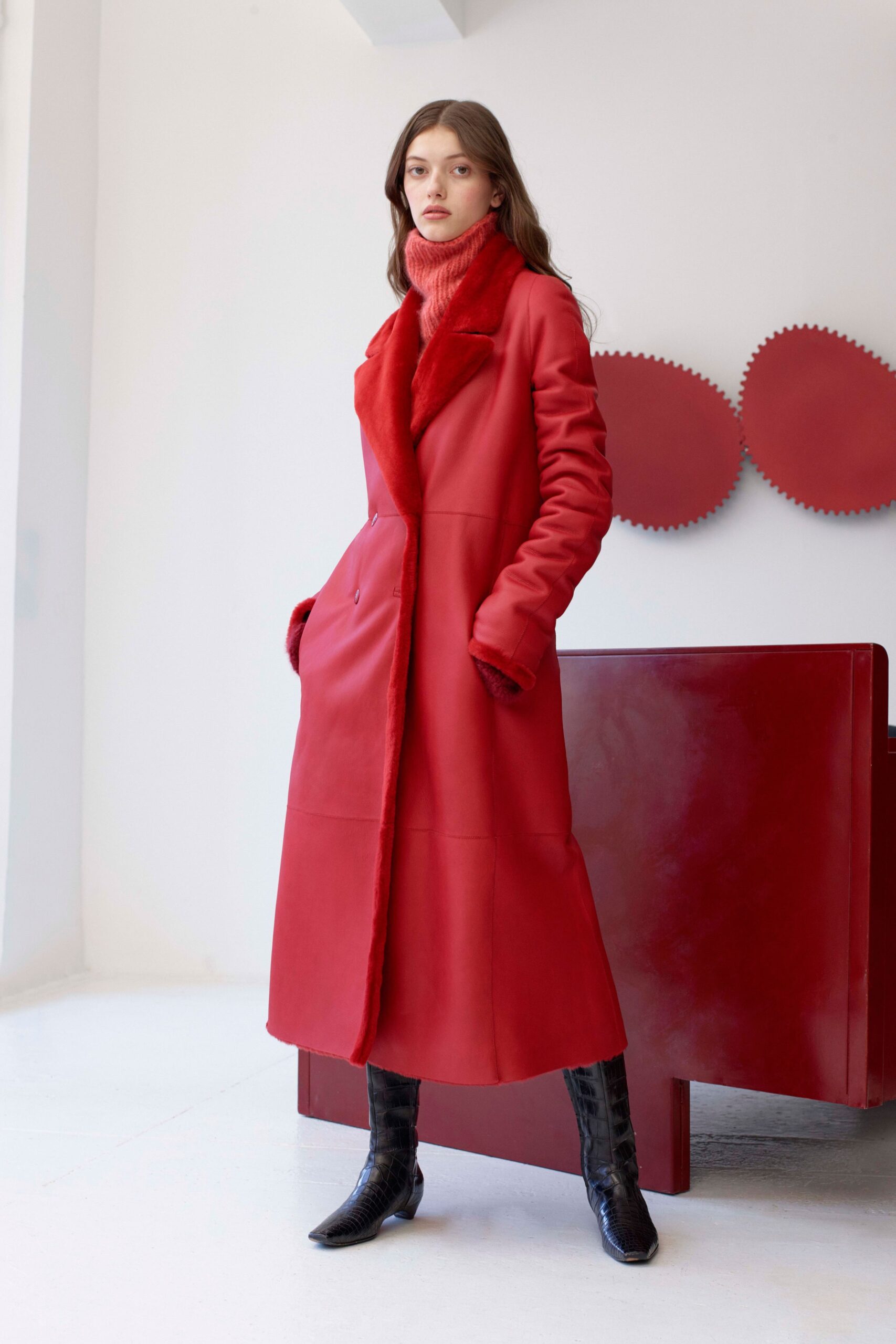 red wool coat with pink sweater