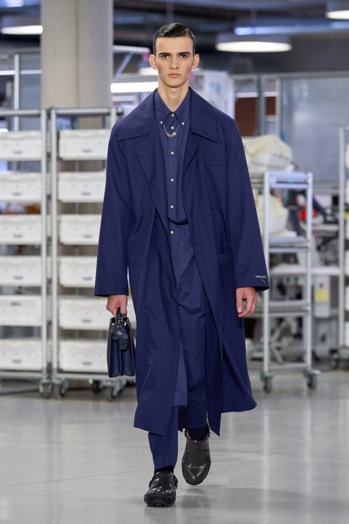 A relaxed blue cotton coat paired with matching pants featuring a collared long-sleeve design.