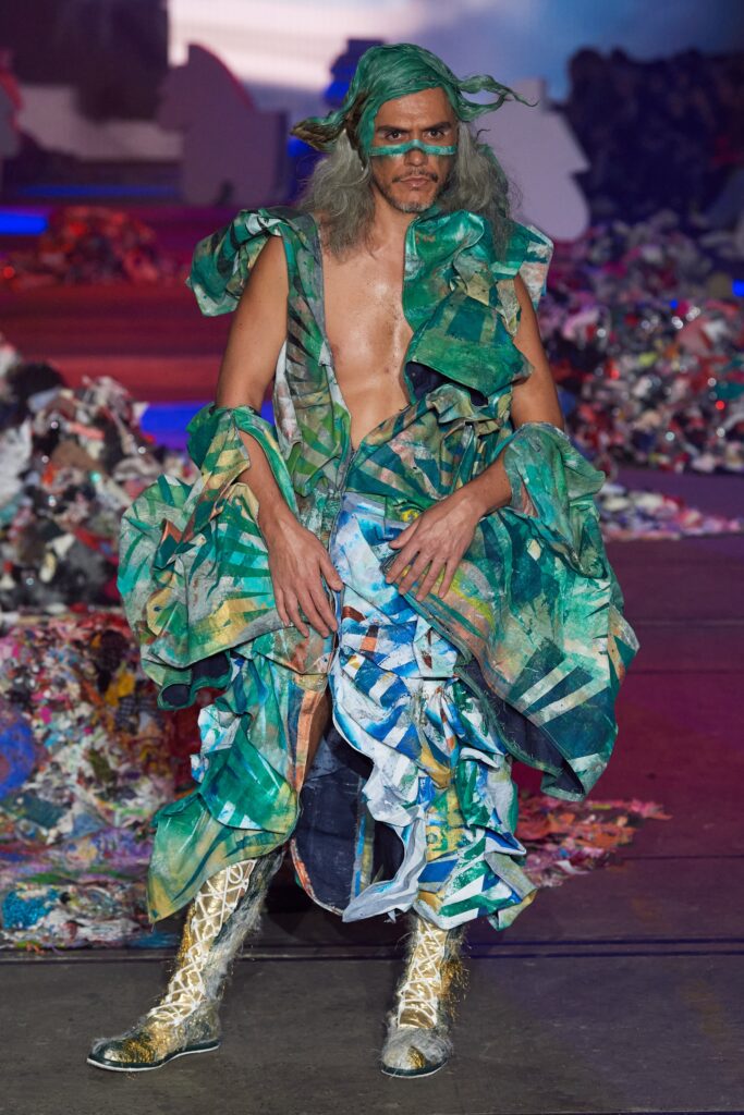 A relaxed multicolor sleeveless dress with a V-neckline and layered design details.