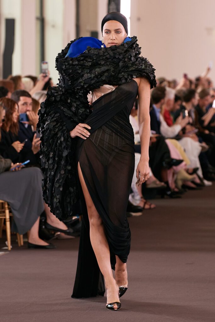 black silk fitted dress with cape