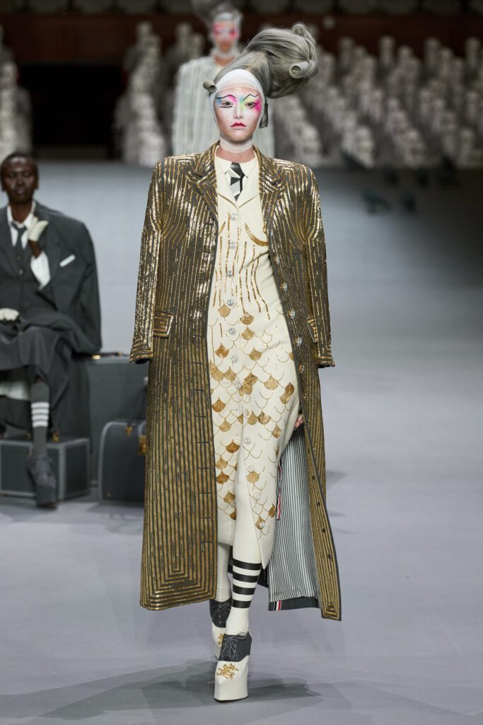 gold and white fitted coat and dress