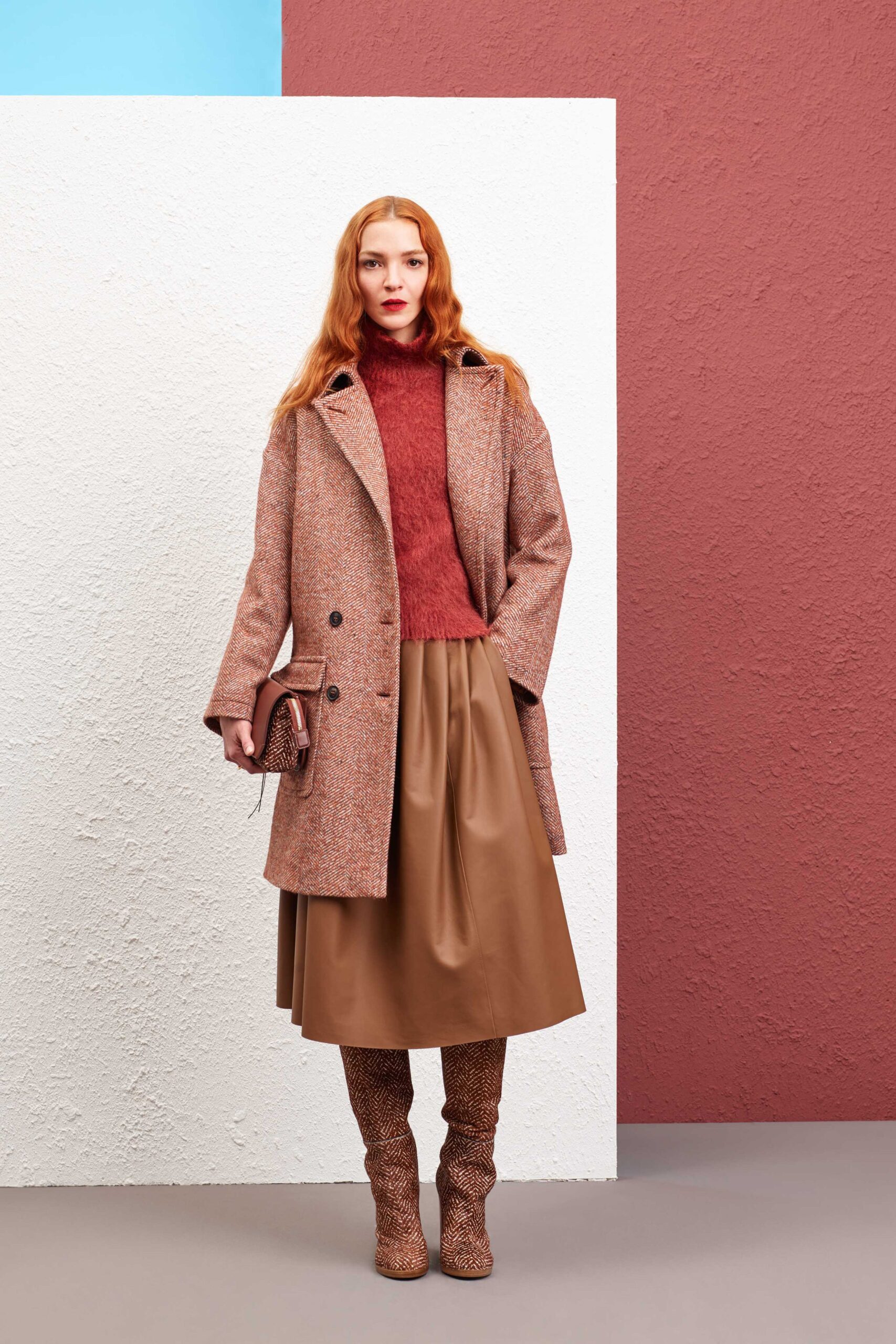 brown wool coat with red sweater