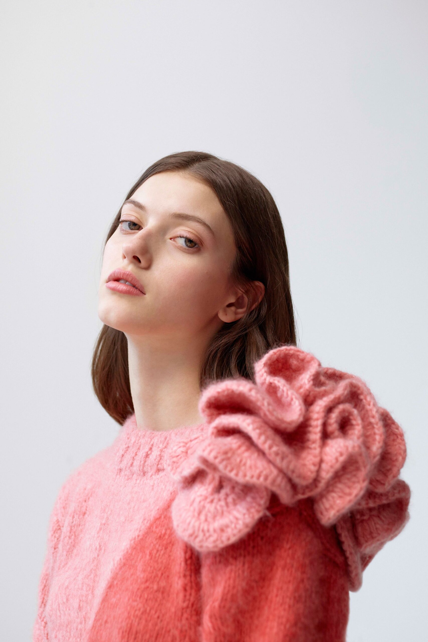 pink fitted wool sweater