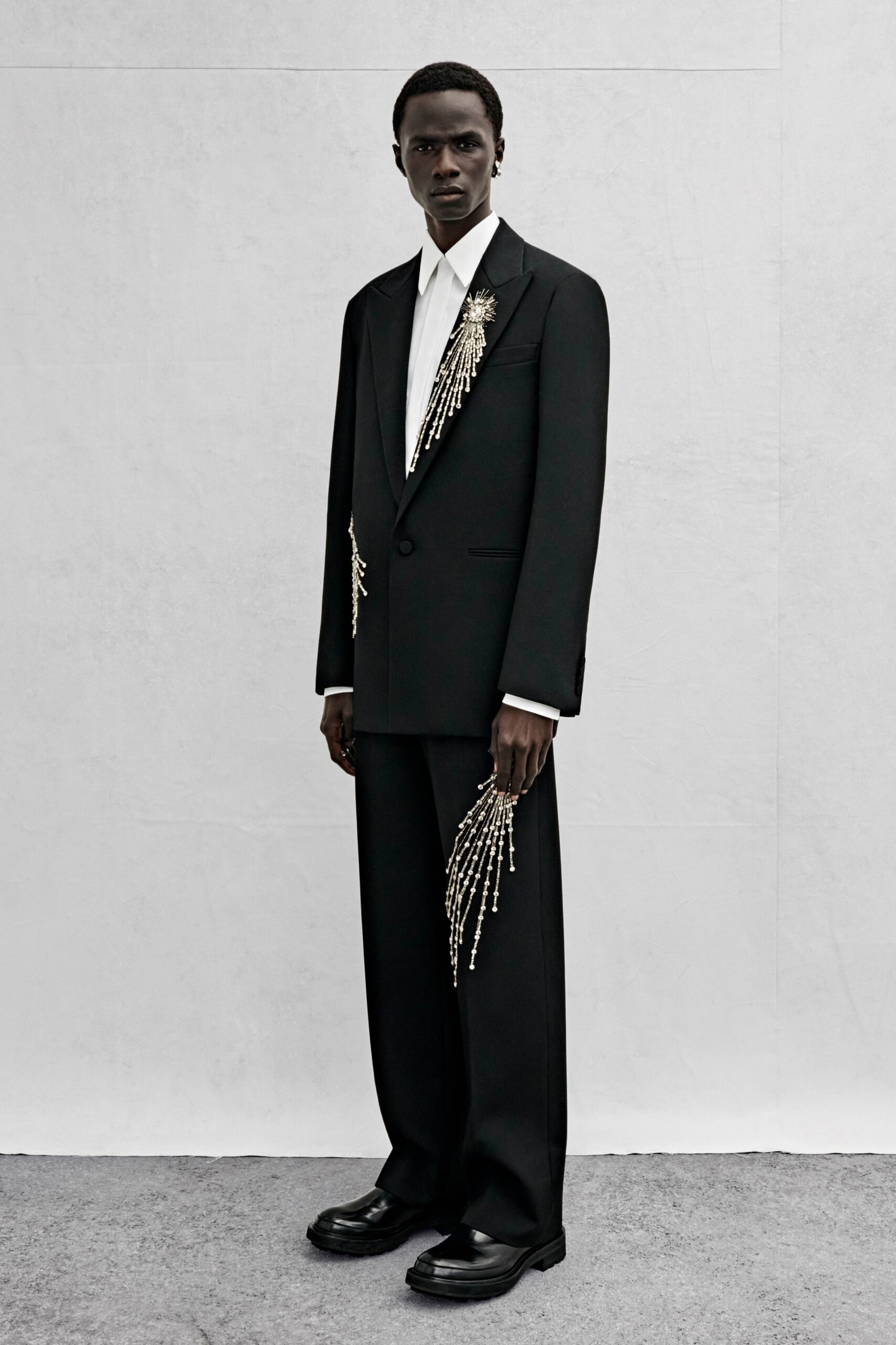 black tailored suit with embellishments
