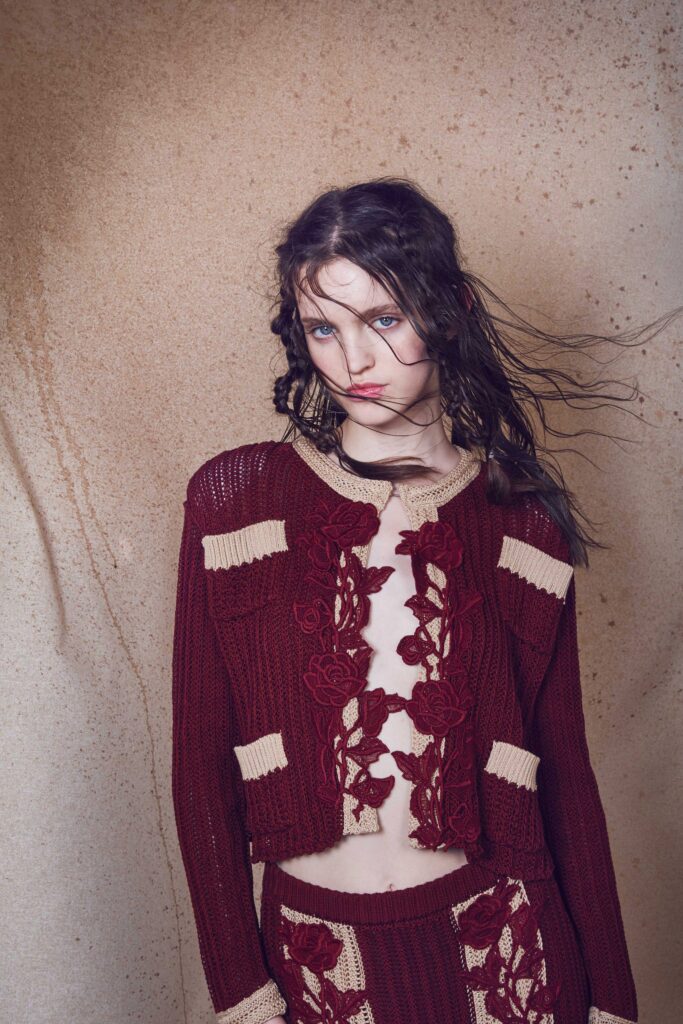 red embroidered cardigan and skirt