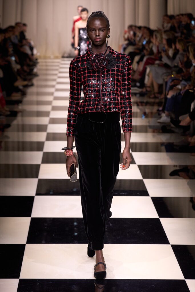 fitted red checked jacket with black velvet pants