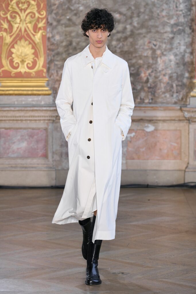 white coat with black boots