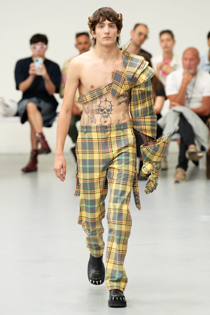 A fitted multicolor checked top and pants with a unique sleeveless design.