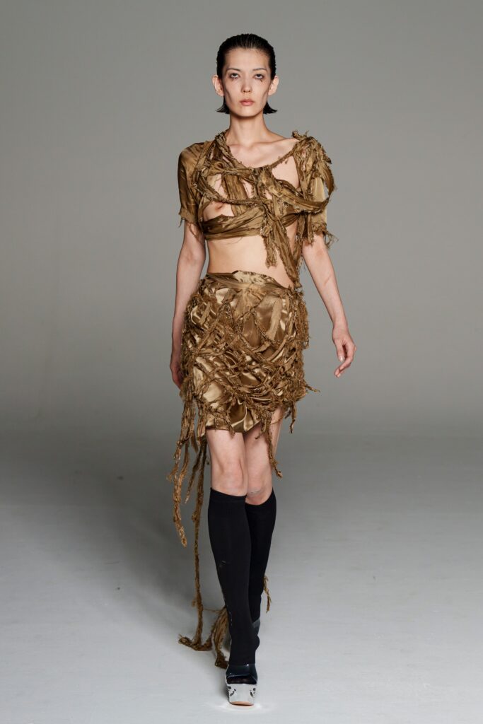 brown fringed top and skirt