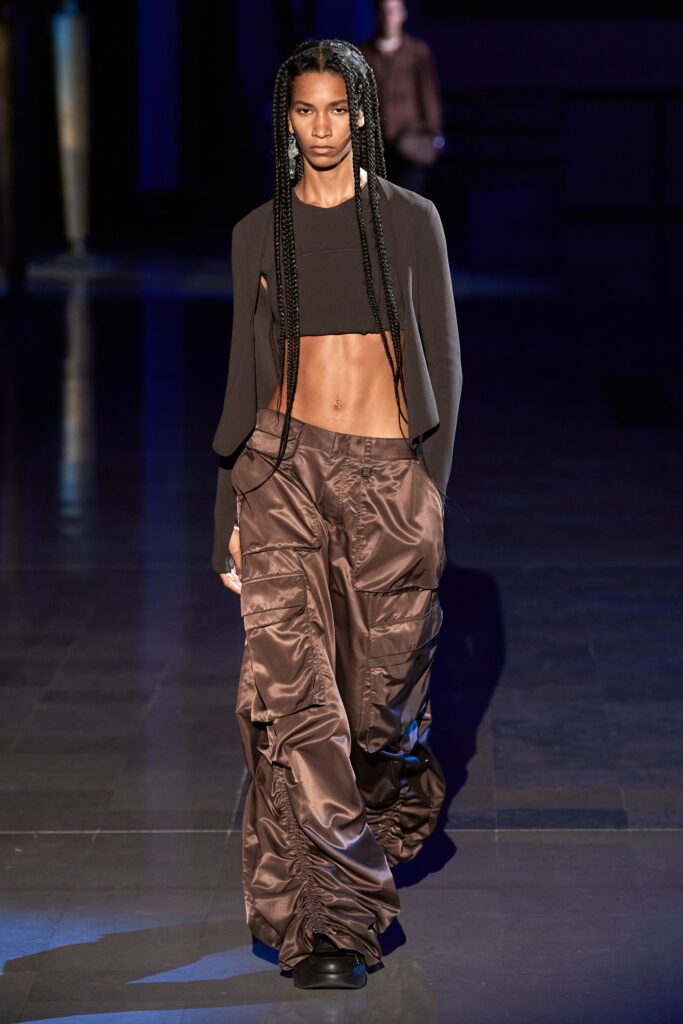 black crop top and brown cargo pants