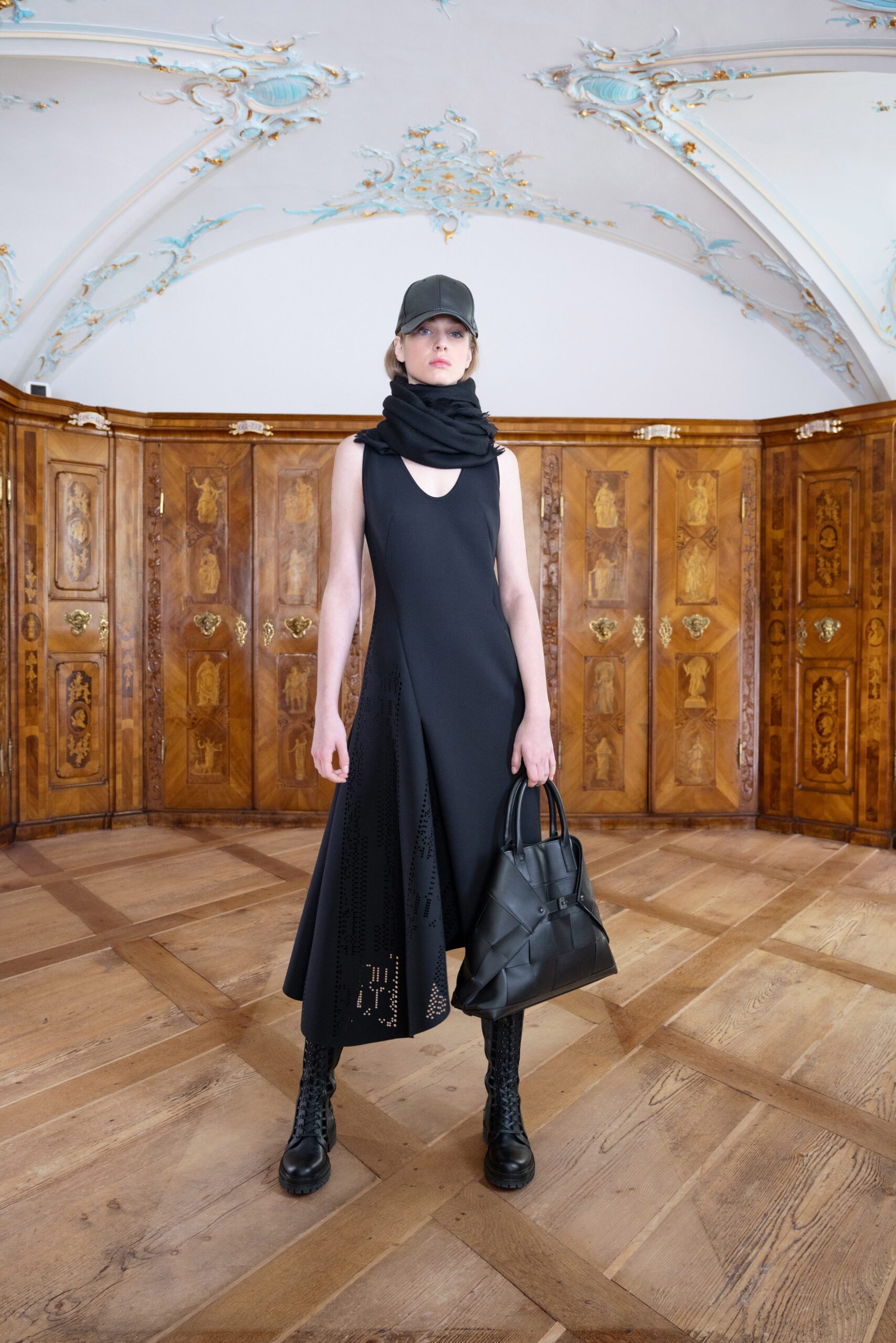 black fitted midi dress with accessories