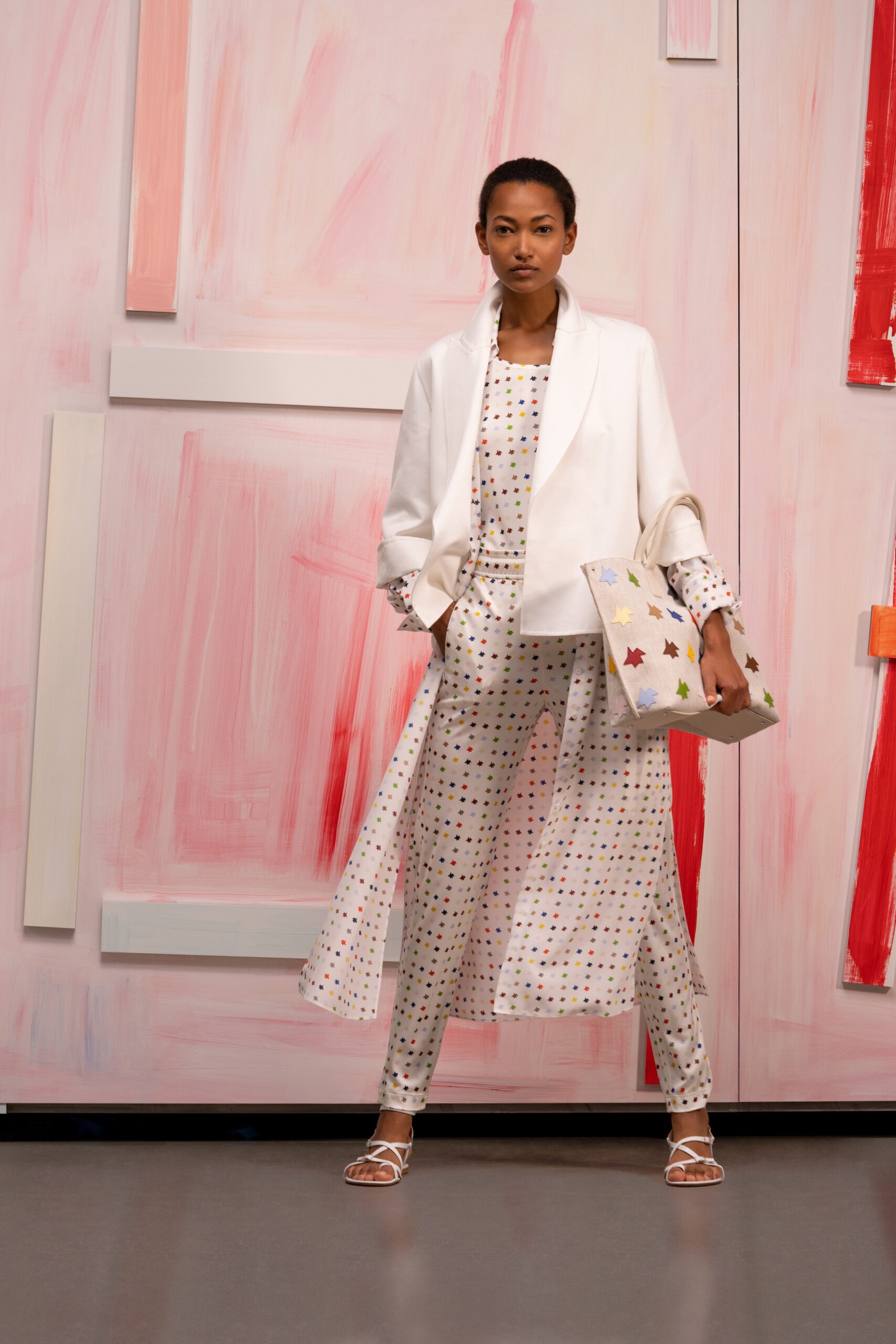 white jacket and jumpsuit ensemble